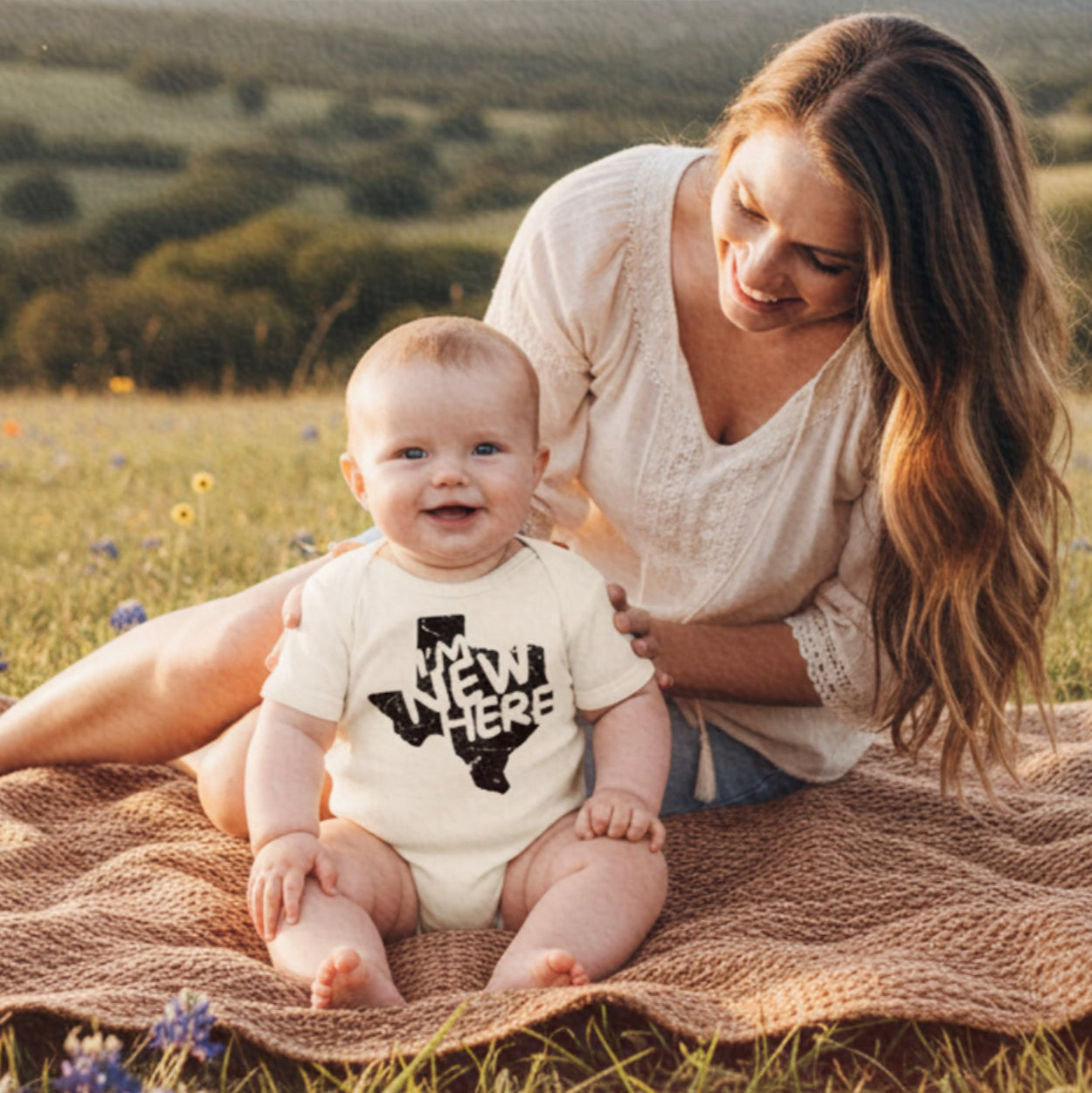'I'm New Here' Organic Cotton Baby Bodysuit
